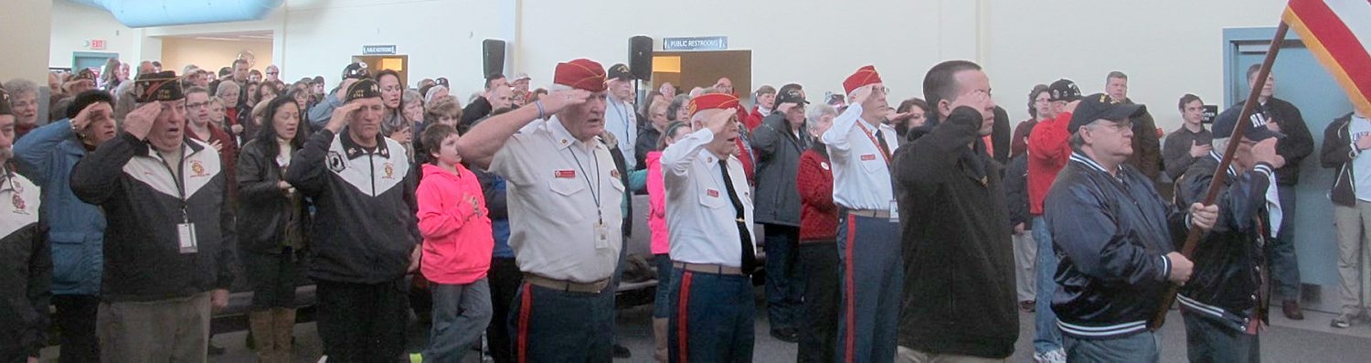 Pease Greeters continue to gather for troops in transit